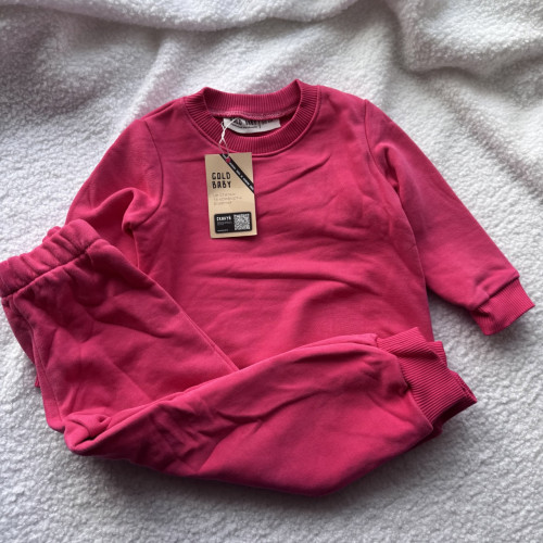 Детский костюм розового цвета 98 размер